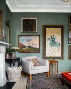 Blue living room with large artworks